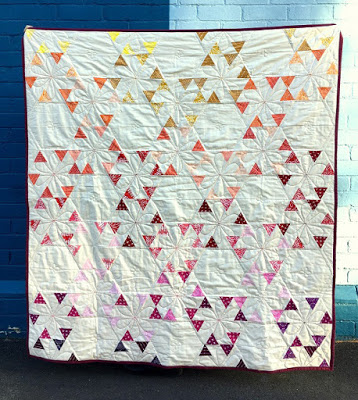 http://www.blossomheartquilts.com/2016/07/little-ruby-confetti-quilt-reveal/