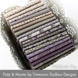 http://www.fatquartershop.com/marcus-brothers/putty-and-mortar-timeworn-toolbox-design-marcus-brothers-fabrics