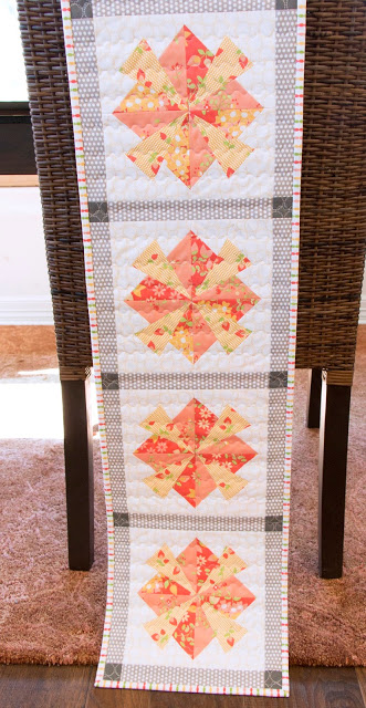 http://www.fatquartershop.com/blooming-sunset-tablerunner-pattern