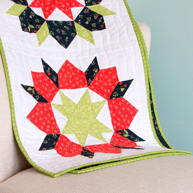 Susan fashioned her Swoon Sixteen blocks into a bright tablerunner.