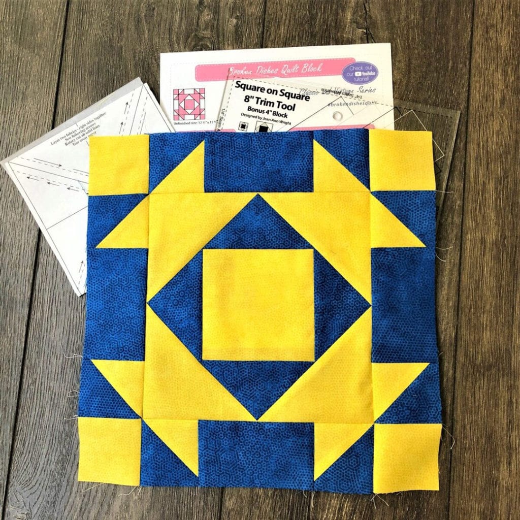 Jan of Cocoa Quilts used fabric scraps to sew up this bright blue and ...