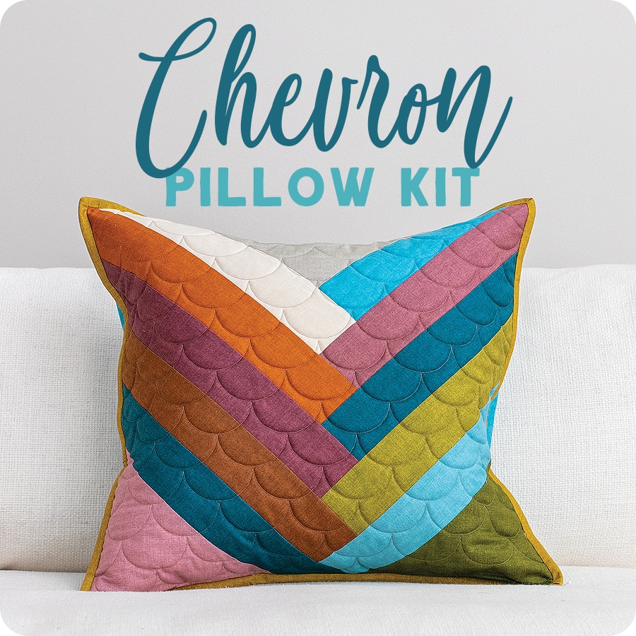 The Chevron throw pillow has strips of fabric at an angle.