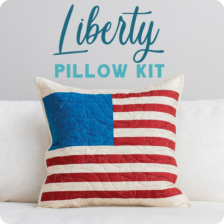 This DIY throw pillow was sewed up to look like the American flag in red, white and blue.
