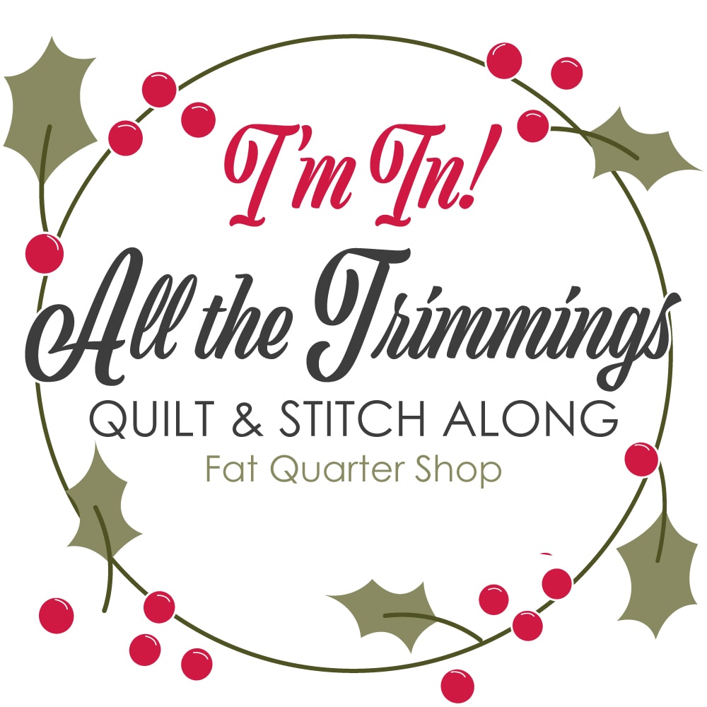 This is the All the Trimmings project badge! It says "I'm In! All the Trimmings Quilt and Stitch Along with Fat Quarter Shop." 