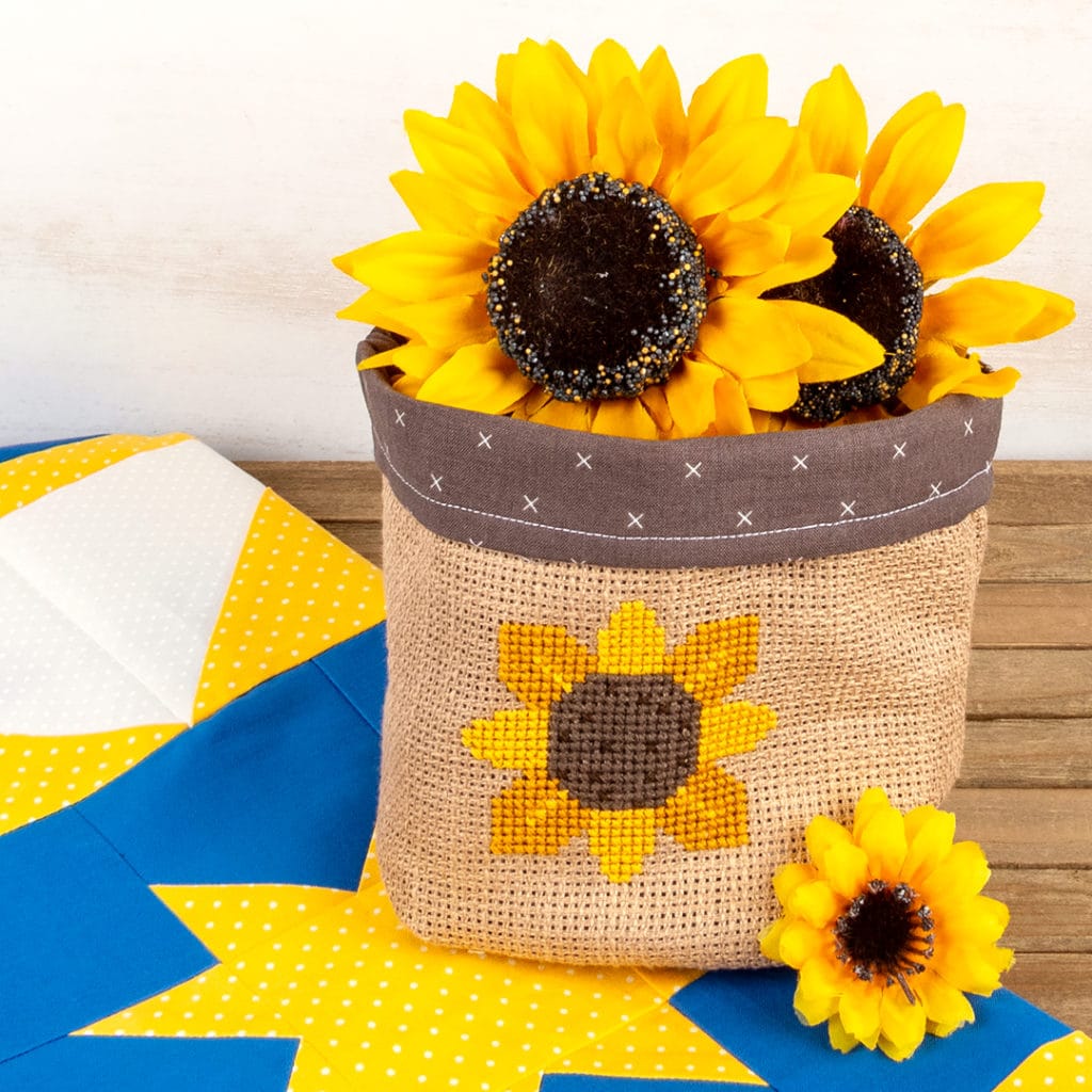 Another angle of the Sunflower Cross Stitch Pattern on a bitty basket that can be done to honor the Ukraine