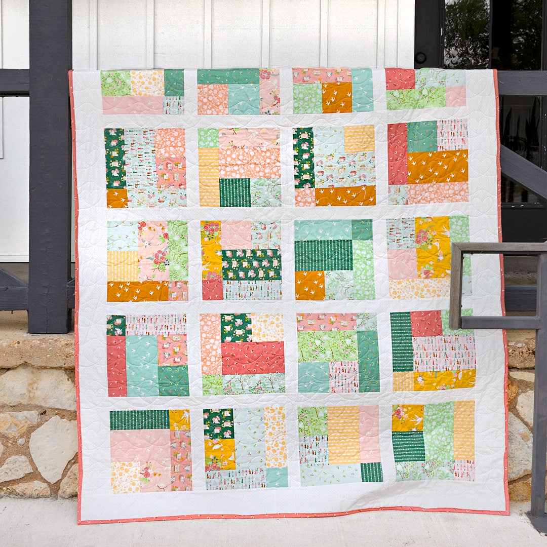 Final photo of Mosaic quilt made with Emma by Citrus and Mint Designs for Riley Blake Designs as my first quilt