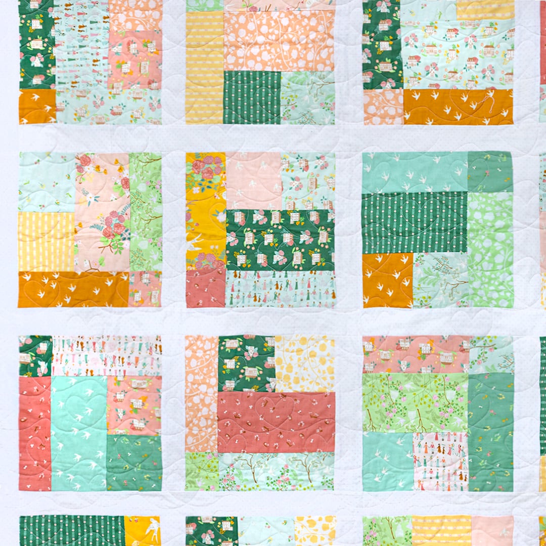 Close up of Mosaic quilt made with Emma by Citrus and Mint Designs for Riley Blake Designs