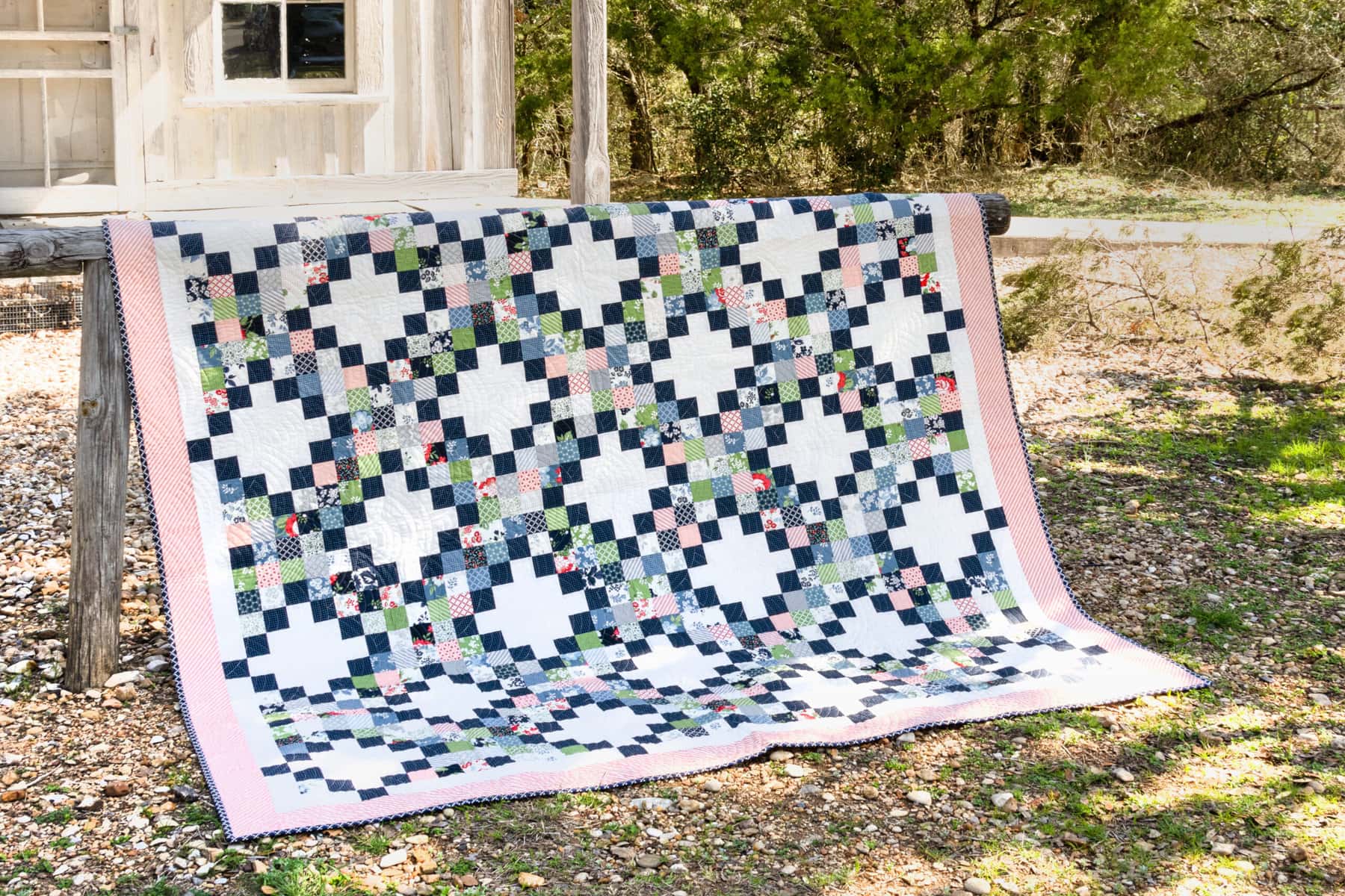 pretty patch quilt made from jelly rolls called nesting quilts