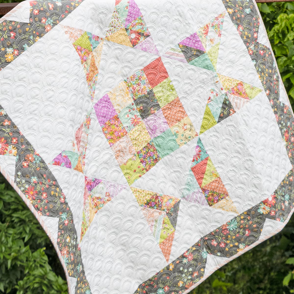 1 Panel + 1 Charm Pack = 1 Precious Baby Quilt! 