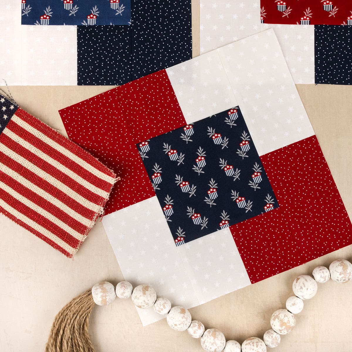 Echoes Blocks for the Quilts of Valor National Sew Day 2026 sewn with fabric from the American Gatherings III collection by Primitive Gatherings, navy center square